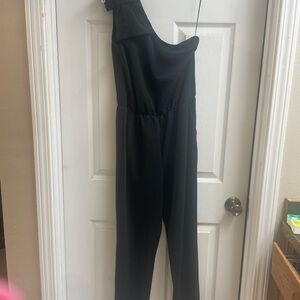 Black long romper. One shoulder, bow detail. Only worn once.